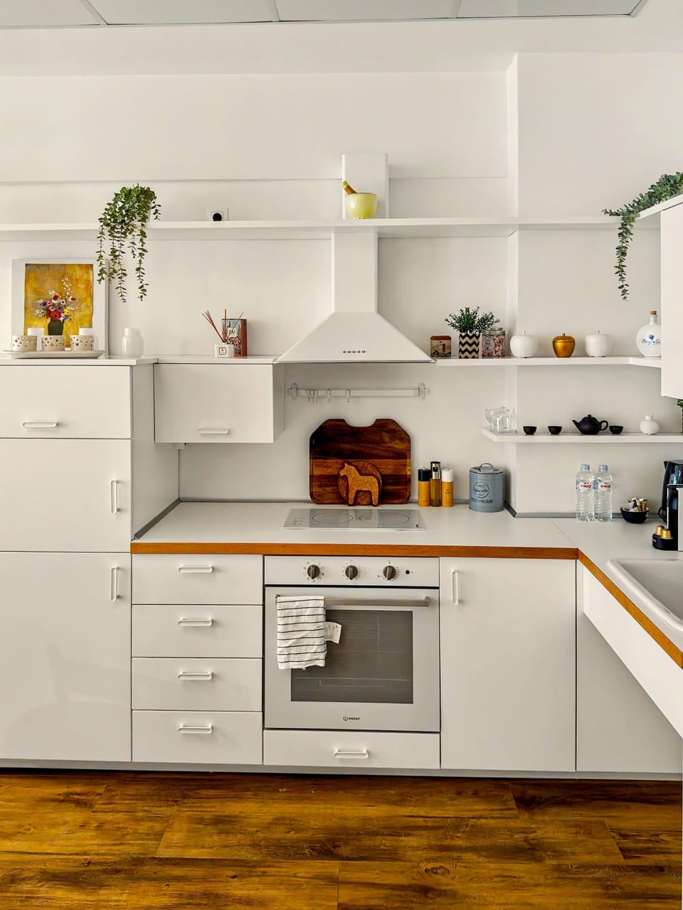Modern kitchen with smart layout and contemporary finishes, designed for convenience and comfort whether cooking or enjoying a quick snack.