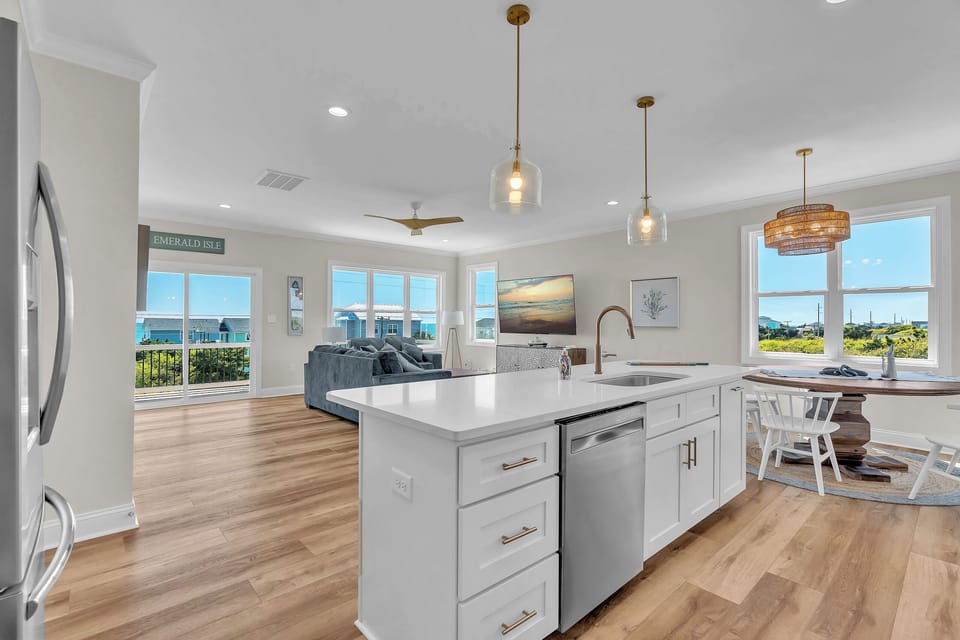You'll love preparing meals in this stunning open-concept kitchen with gorgeous ocean views streaming through oversized windows.