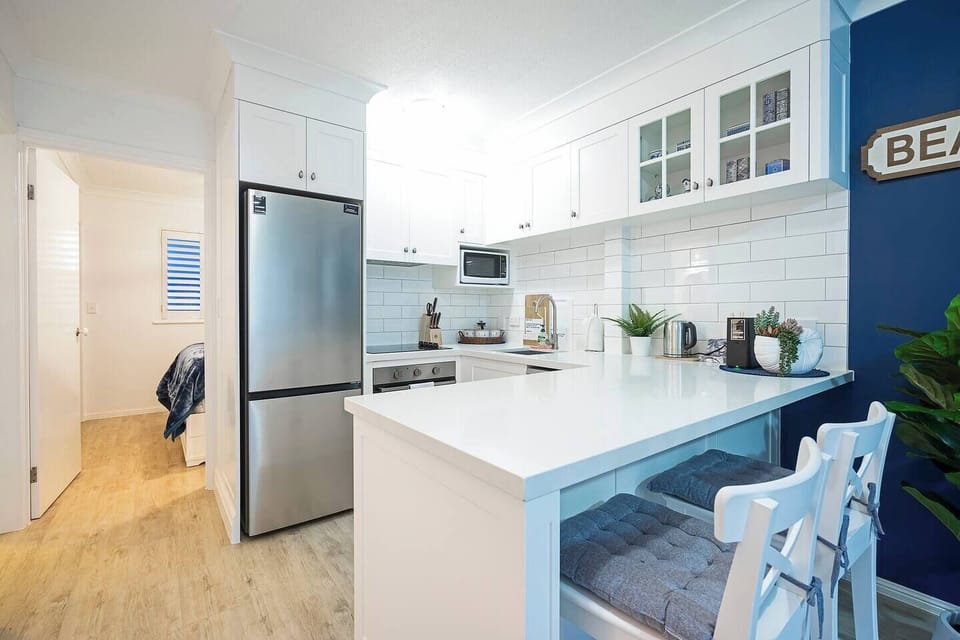 The modern, well-appointed kitchen has everything that is needed to cook meals at home. 