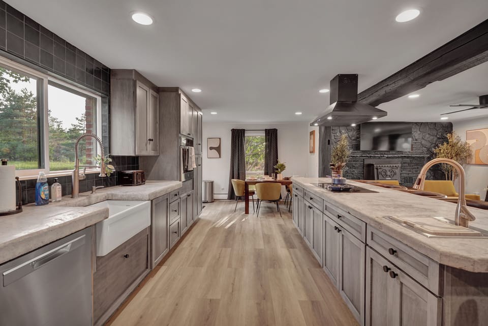 Open-concept kitchen flowing seamlessly into gathering spaces.