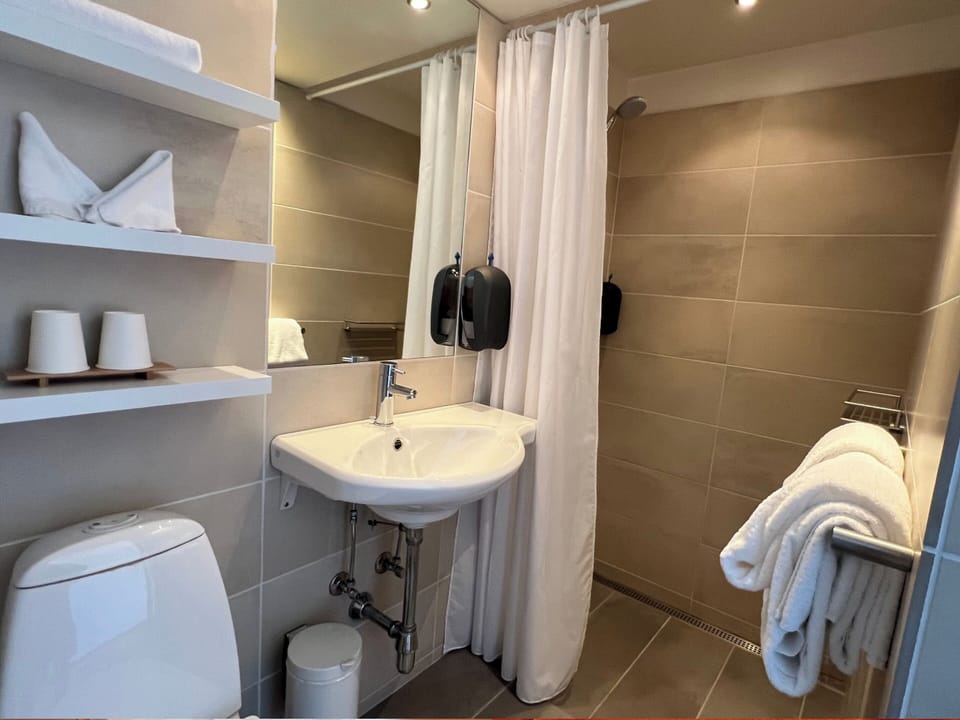 Shower, towels, soap, shampoo