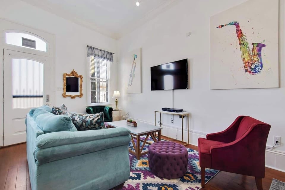Inviting living room with comfortable seating—great for relaxing, chatting, or watching TV together.