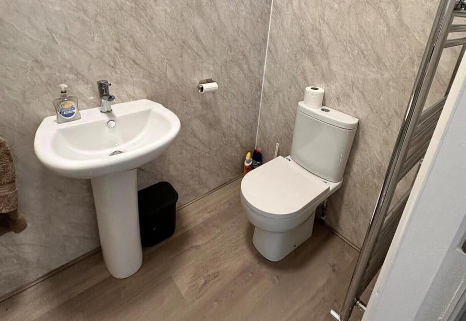 Separate tub and shower, deep soaking tub, hair dryer, towels