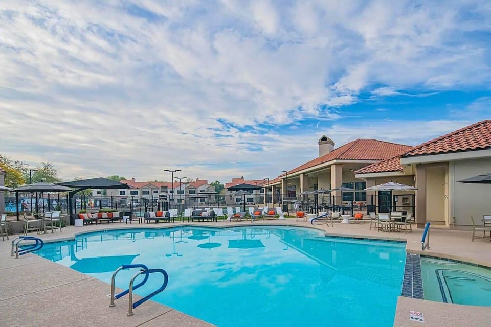 Dive into refreshing blue waters, relax poolside under the sun!