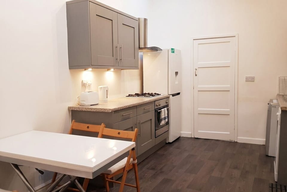 A well-equipped kitchen with gas hob, oven, and fridge to make every meal feel effortless.