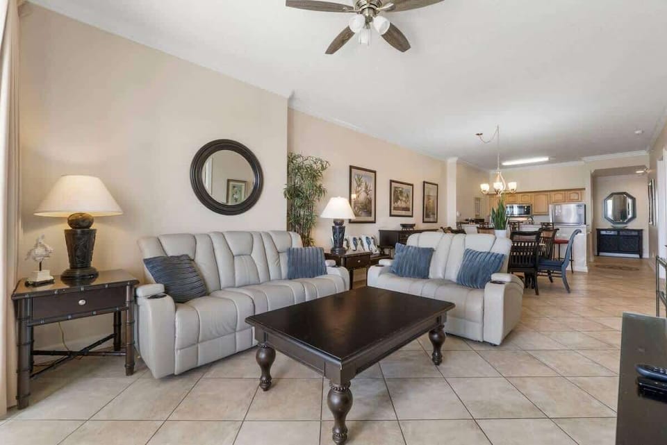 Ocean Front Living Area with Flat Screen TV and Private Balcony Access