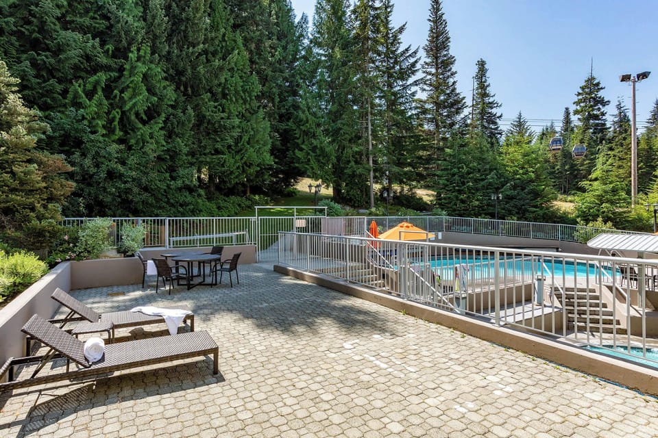 - Heated outdoor pool with stunning Whistler forest views - Swim surrounded by snow-capped beauty and crisp air - Relaxing retreat for all seasons with mountain serenity