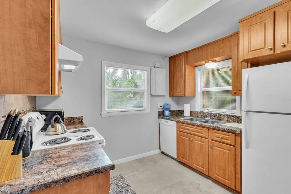 Fully-equipped kitchen with cookware, dinnerware & all the necessities to make a meal!