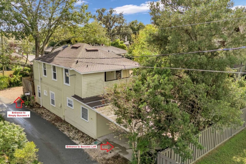 Aerial side-view of the second home with entry directions for 2-bedroom and one bedroom loft.