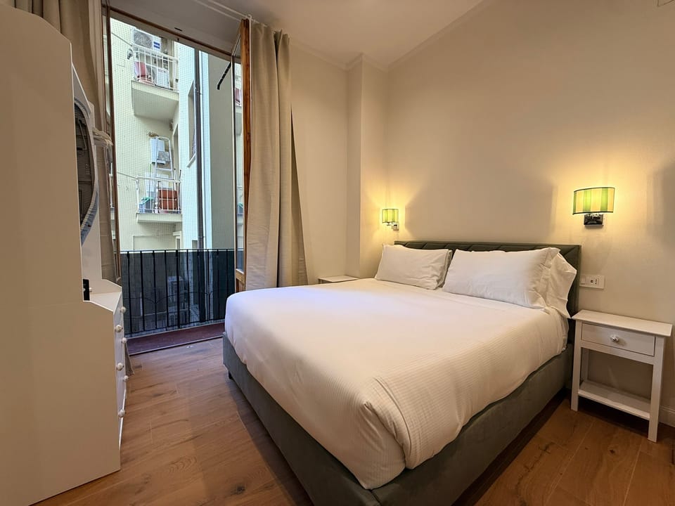 Economy Double Room, Balcony | In-room safe, desk, iron/ironing board, free WiFi