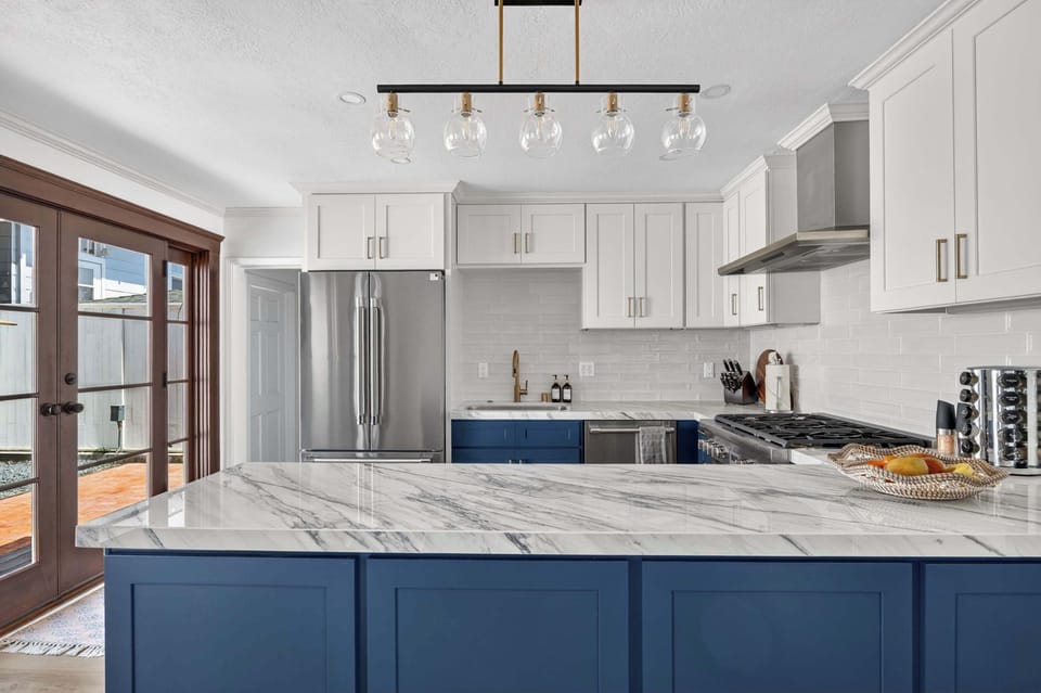 Beautiful, modern kitchen with a spacious island and elegant finishes.