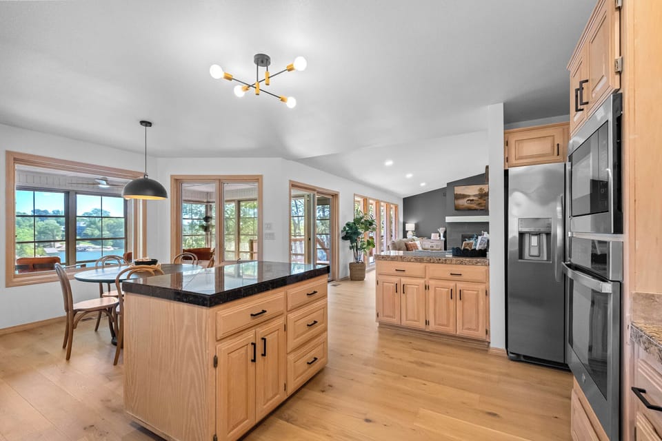 Access to sunroom and upper deck area from the kitchen / living area!