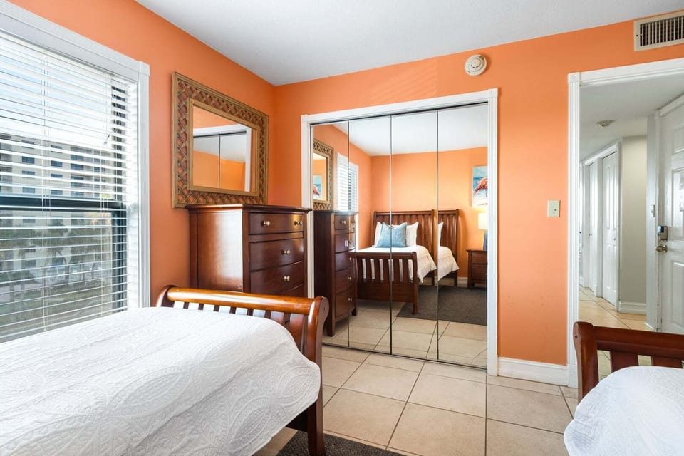 Orange themed guest bedroom
