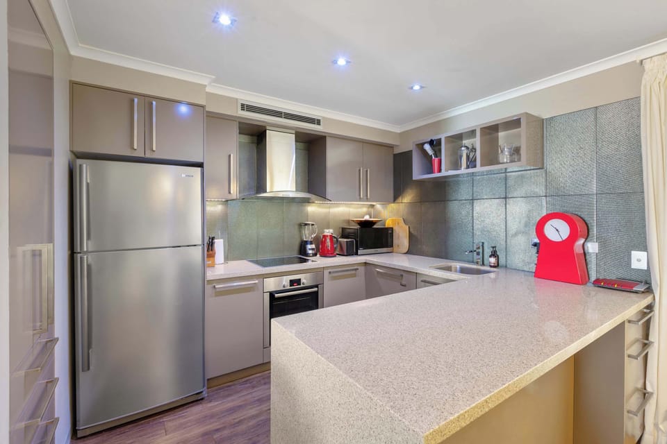 Functional kitchen with quality appliances and generous bench space