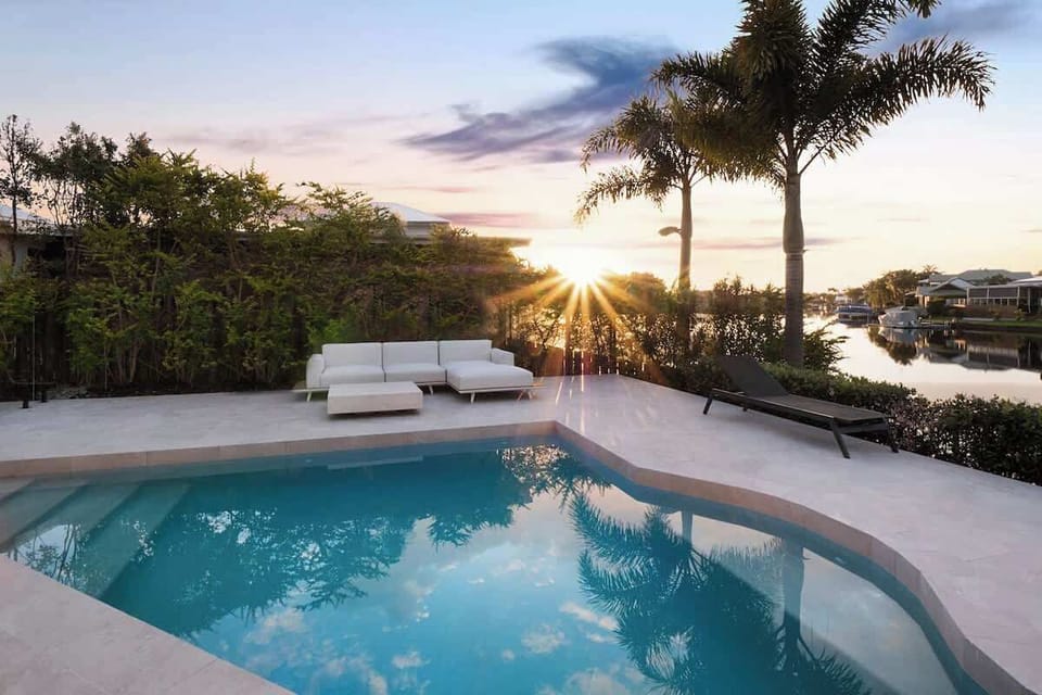 Stunning newly renovated pool overlooking the canal.