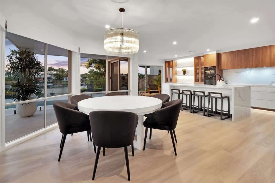 Dining table and island bench both relaxing spots to enjoy cooking/eating/entertaining.