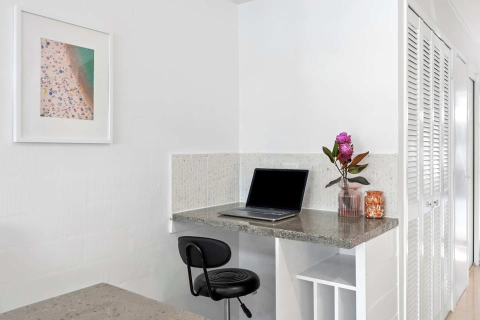 Dedicated workspace perfect for remote work during your Sunshine Beach escape