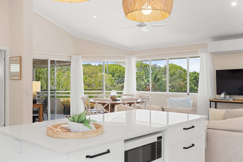 Beautifully styled interiors with relaxed beachside charm throughout
