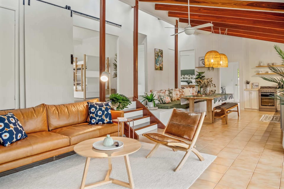 Unwind in a serene, stylish getaway featuring open, airy spaces, natural accents, and lush views for a perfect holiday escape.
