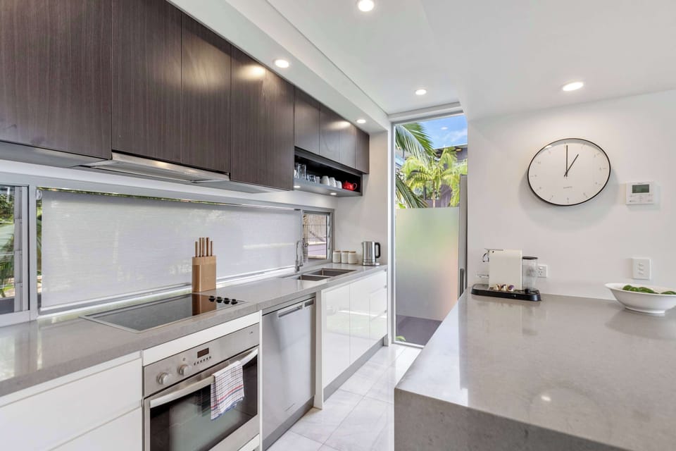 Prepare everything from simple breakfasts to family dinners in the fully equipped kitchen, complete with generous bench space and breakfast seating.