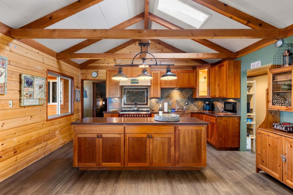 Modern appliances, including a custom stove.