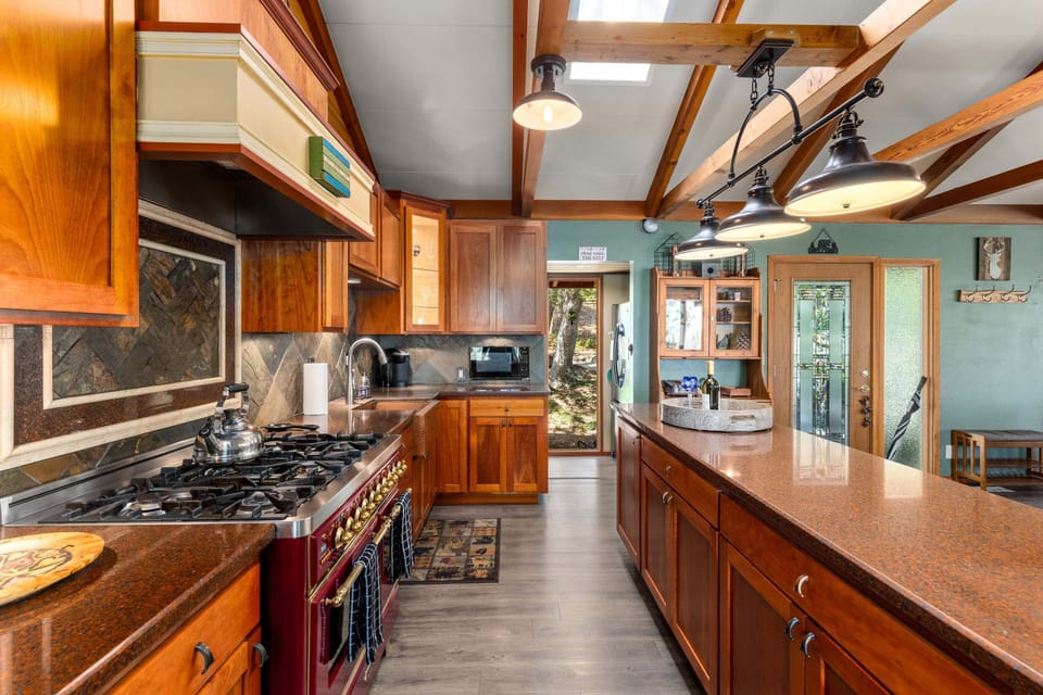 Modern appliances, including a custom stove.