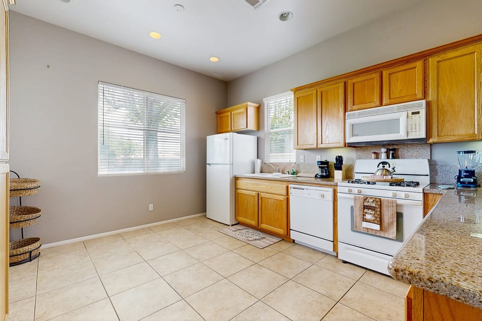 Complete with drip coffee maker, toaster, blender, and kitchen essentials.