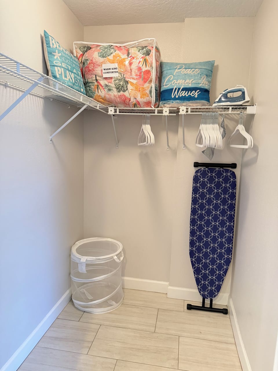 Spacious walk-in closet. Ironing board, iron, hangers. Extra blanket. 