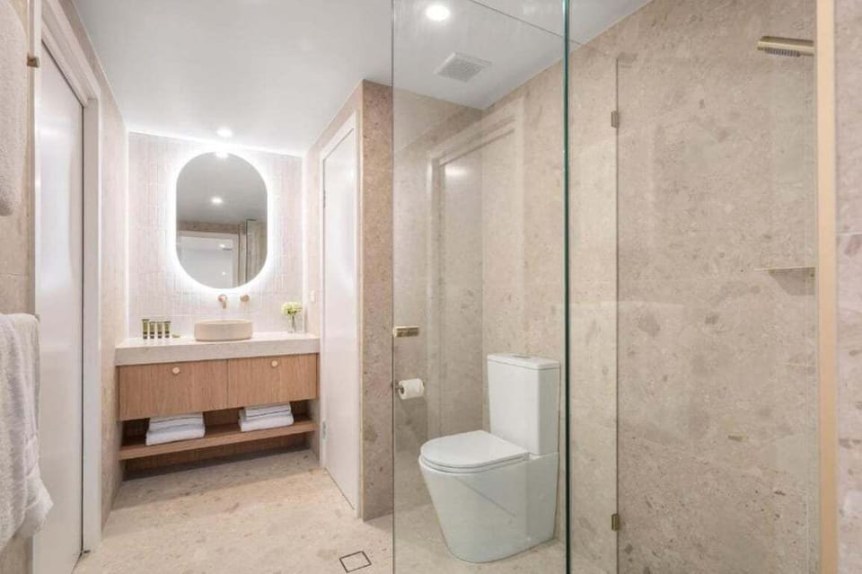 Renovated marbled bathroom with modern fixtures