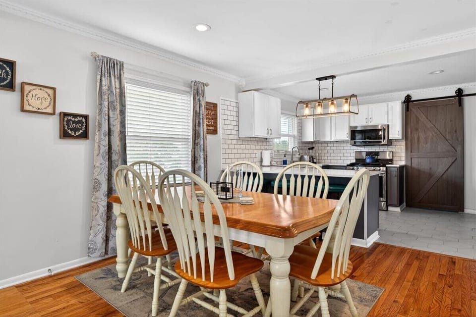 Dining Area: Gather and enjoy meals in this inviting dining area, designed for comfort and connection in a warm, welcoming space.