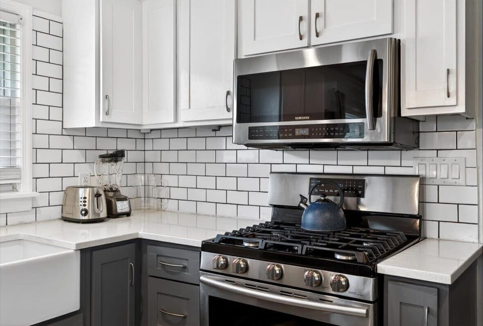 Kitchen: Cook with ease in this fully equipped kitchen, designed with modern appliances and a functional layout for everyday convenience.