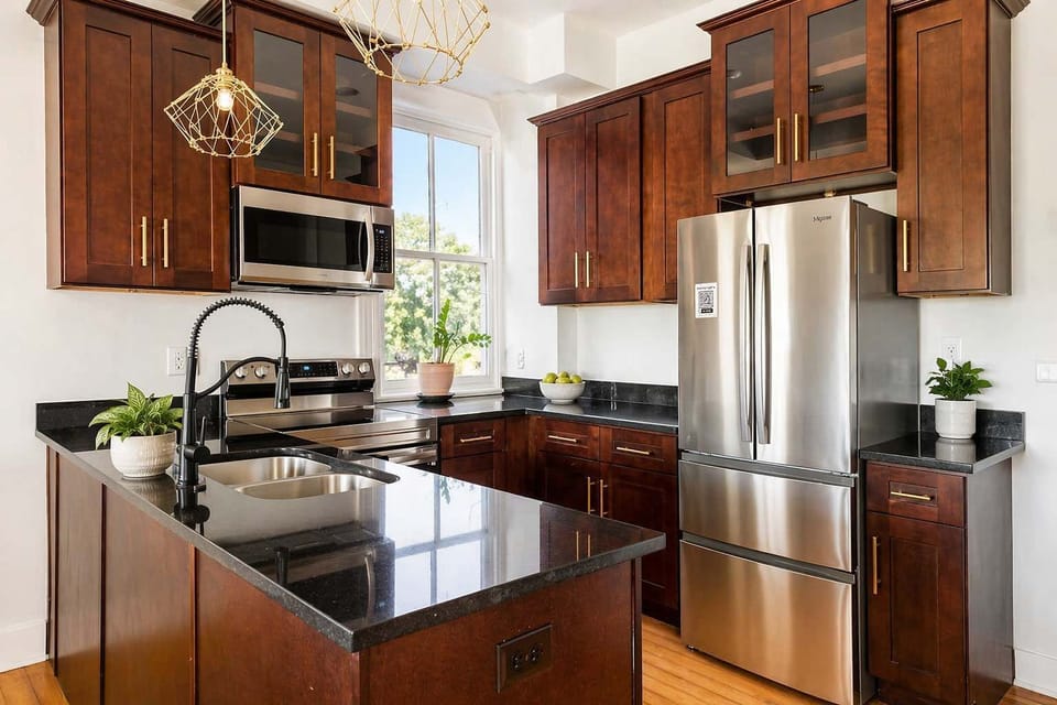 Kitchen: Fully equipped kitchen featuring contemporary appliances, ample counter space, and a bright, airy feel. Ideal for preparing meals or enjoying a relaxed dining experience at home.