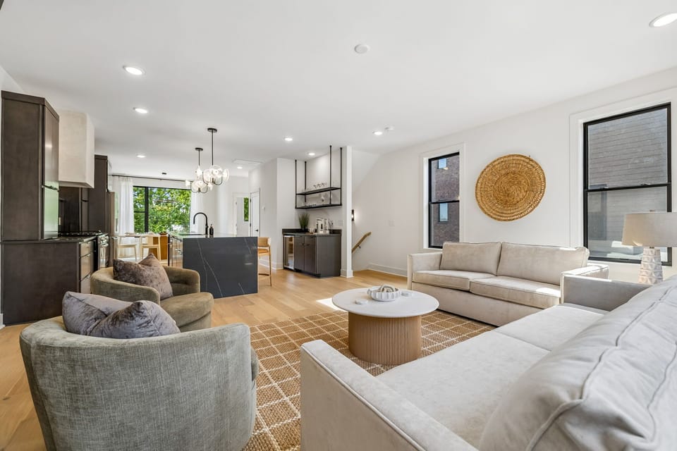Living Room: Unwind in this spacious and stylish living area with comfortable sofas, warm lighting, and elegant touches throughout. Whether you’re reading, streaming your favorite shows, or simply relaxing, this space offers comfort and calm.