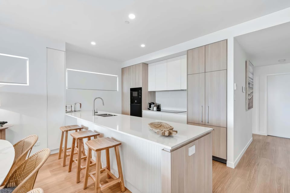 Fully equipped kitchen with sleek modern finishes.