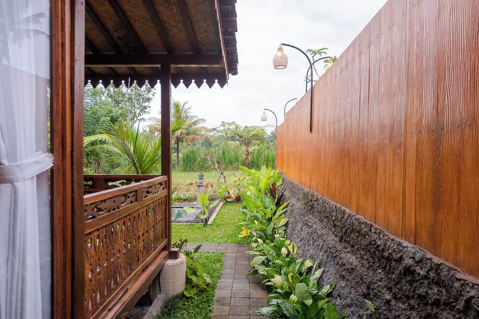 Deluxe Villa, 1 Bedroom, Patio, Pool View | Living area | 32-inch LCD TV with cable channels