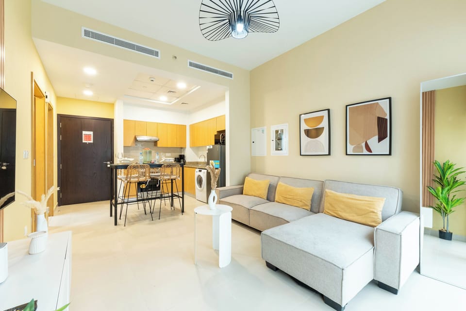 Deluxe Apartment | Living area | 65-inch Smart TV with cable channels, Netflix, streaming services