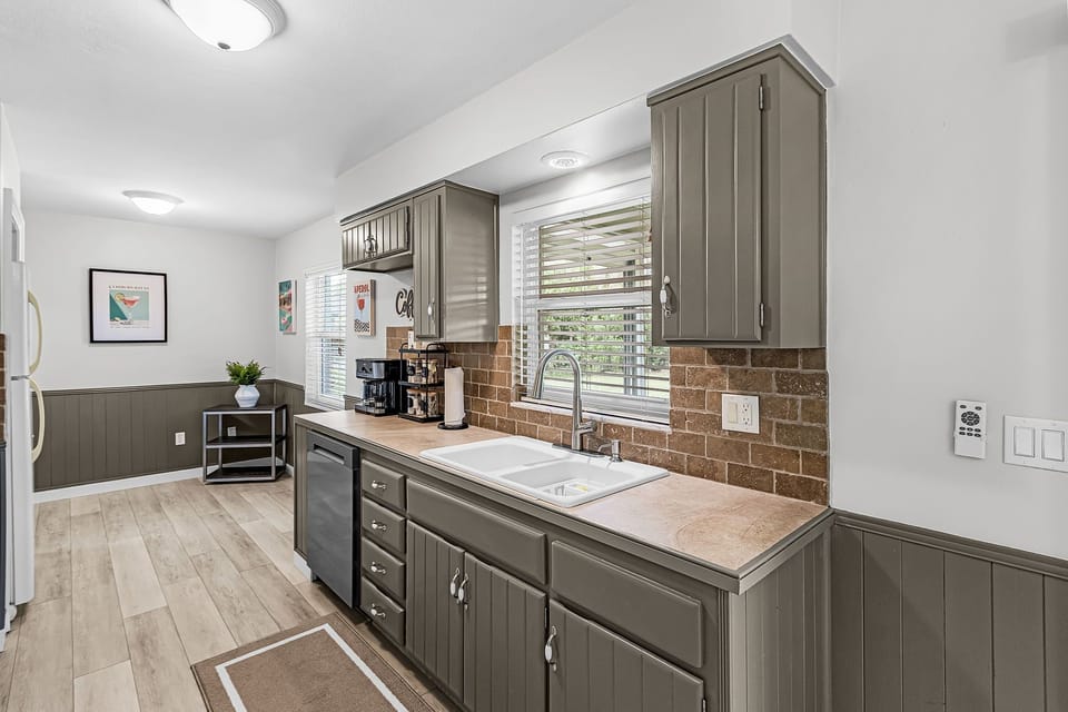 Chef-ready kitchen with modern upgrades and plenty of light.