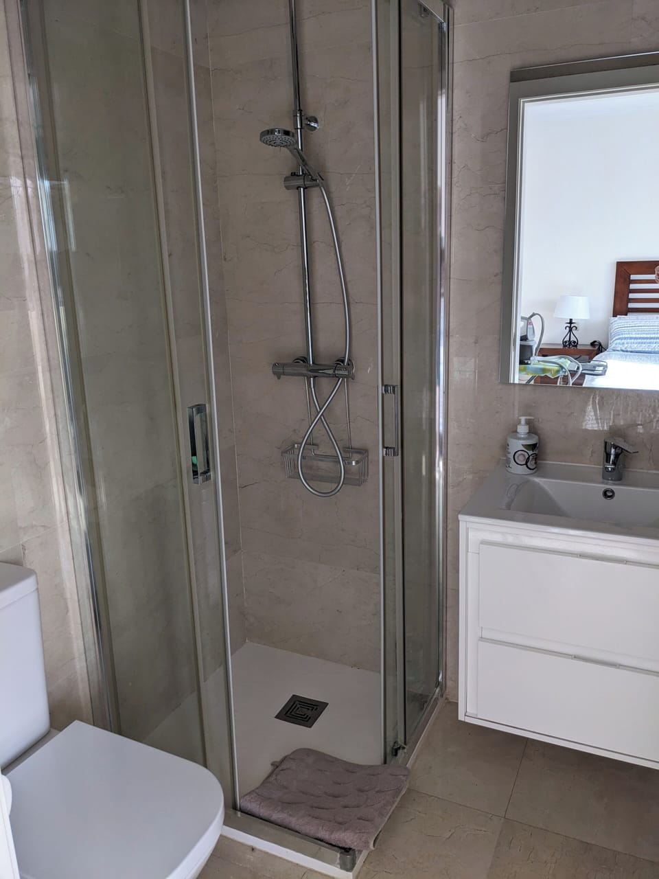 shower, hand held showerhead, indoor, bathroom shower, toilet, bathroom