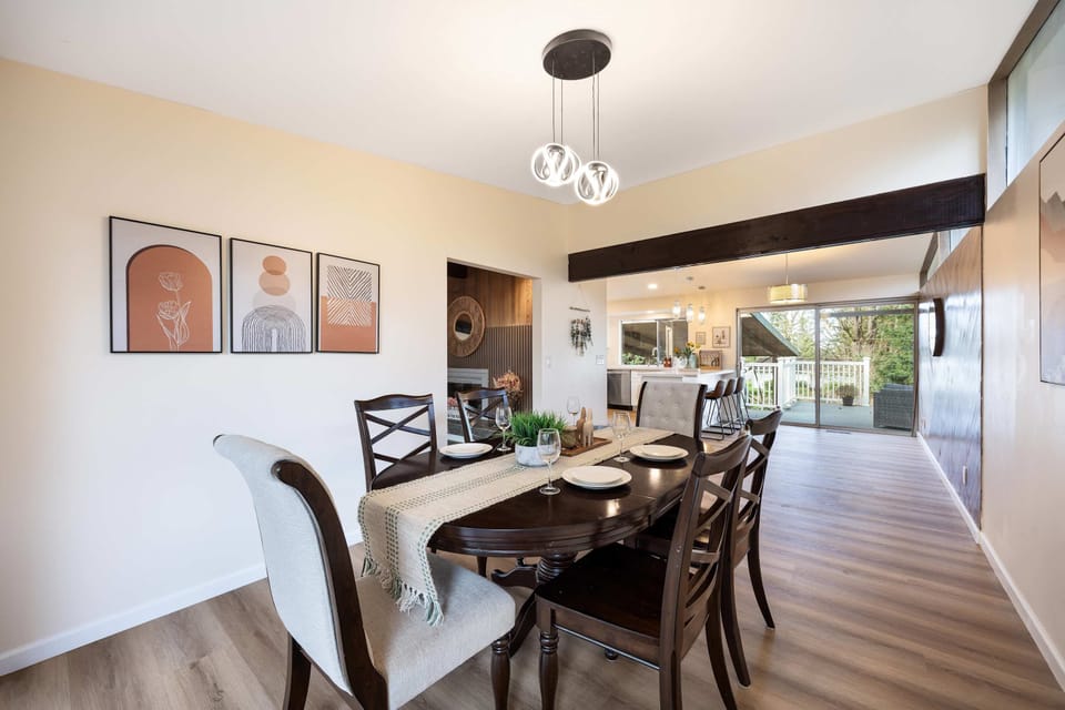 From the dining table, you can see the bright kitchen—perfect for hosting and entertaining friends and family.