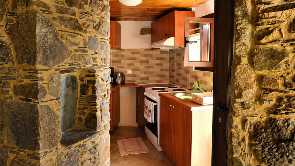 Fully equipped kitchen with traditional design touches.