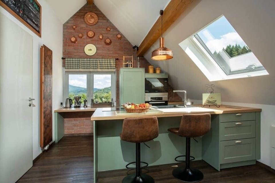The kitchen is fully equipped with modern appliances and all necessary cooking utensils.