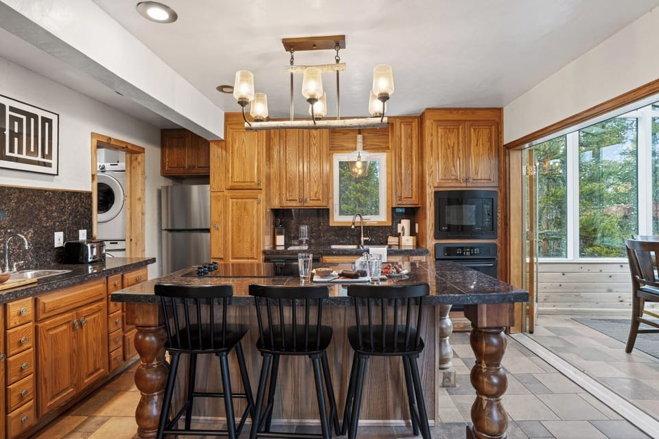 Warm, rustic kitchen with spacious island seating.