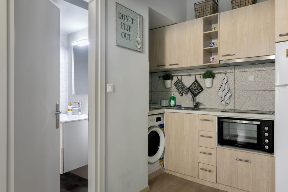 Apartment, 2 Bedrooms, Kitchen, City View | Private kitchen | Full-size fridge, oven, stovetop, espresso maker