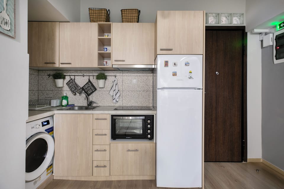Apartment, 2 Bedrooms, Kitchen, City View | Private kitchen | Full-size fridge, oven, stovetop, espresso maker