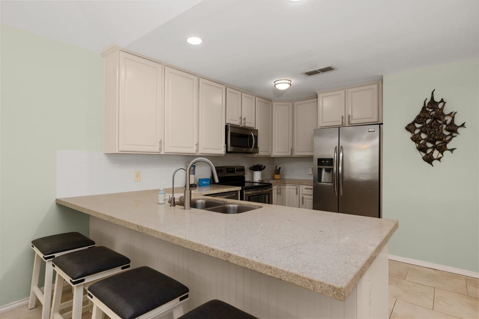 Spacious kitchen with bar seating—great for casual meals