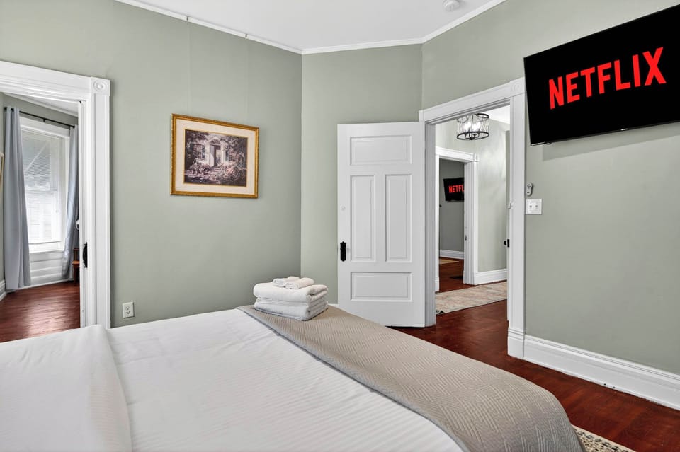 Bedroom 2: Unwind in this inviting bedroom with comfortable bedding and a serene ambiance. Designed for relaxation, it’s the perfect place to recharge and feel at home.