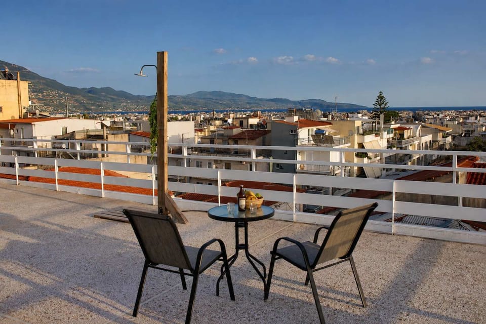 Outdoor dining area on the rooftop terrace