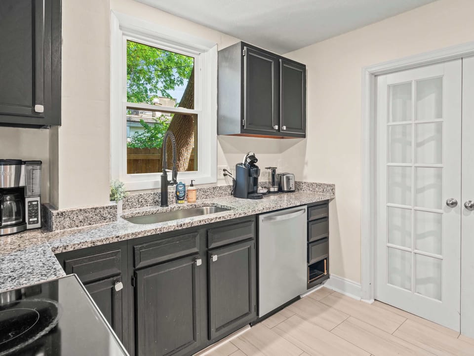 Kitchen: Whether you're preparing a quick snack or a full dinner, this spacious kitchen offers everything you need in a bright and welcoming space.