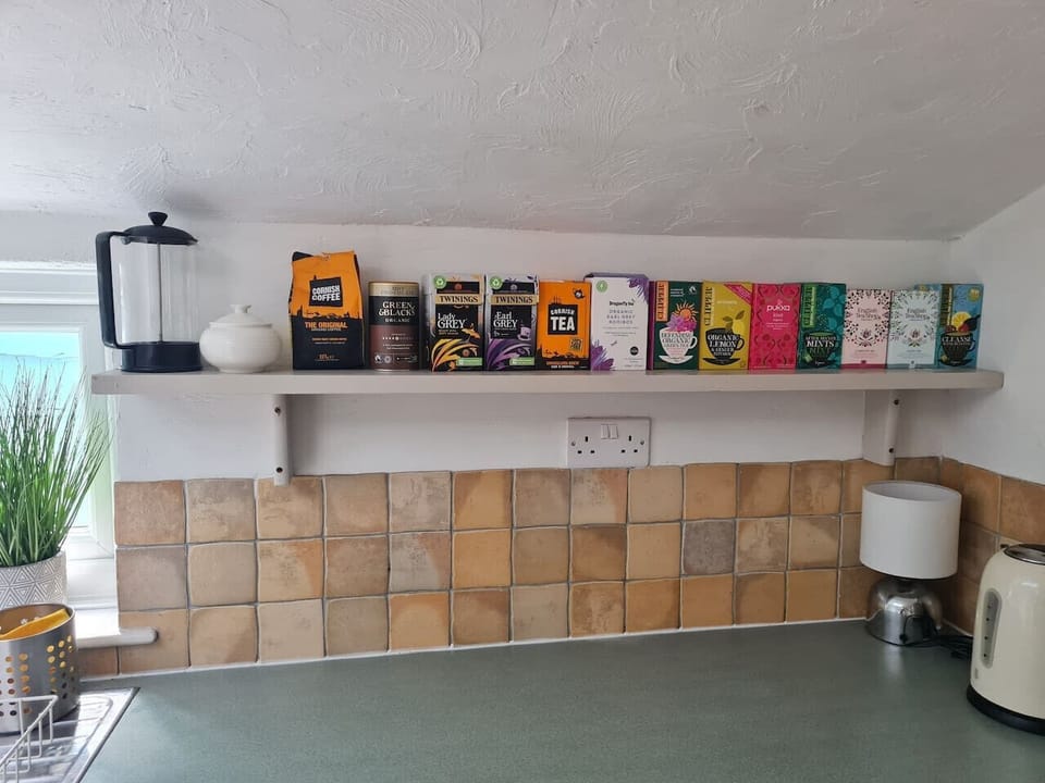 Cornish Coffee and a whole wall of teas greet you every morning.