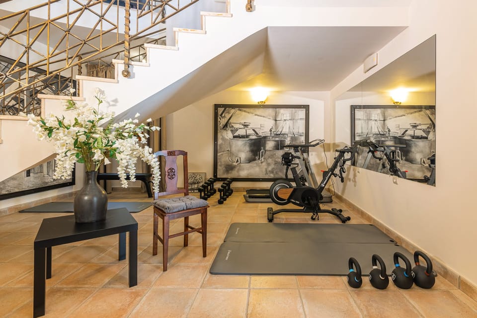 A fully equipped gym area designed for daily wellness and energizing workouts.